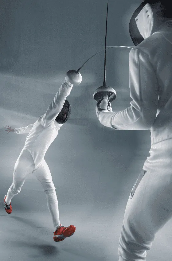 two fencers that are fencing