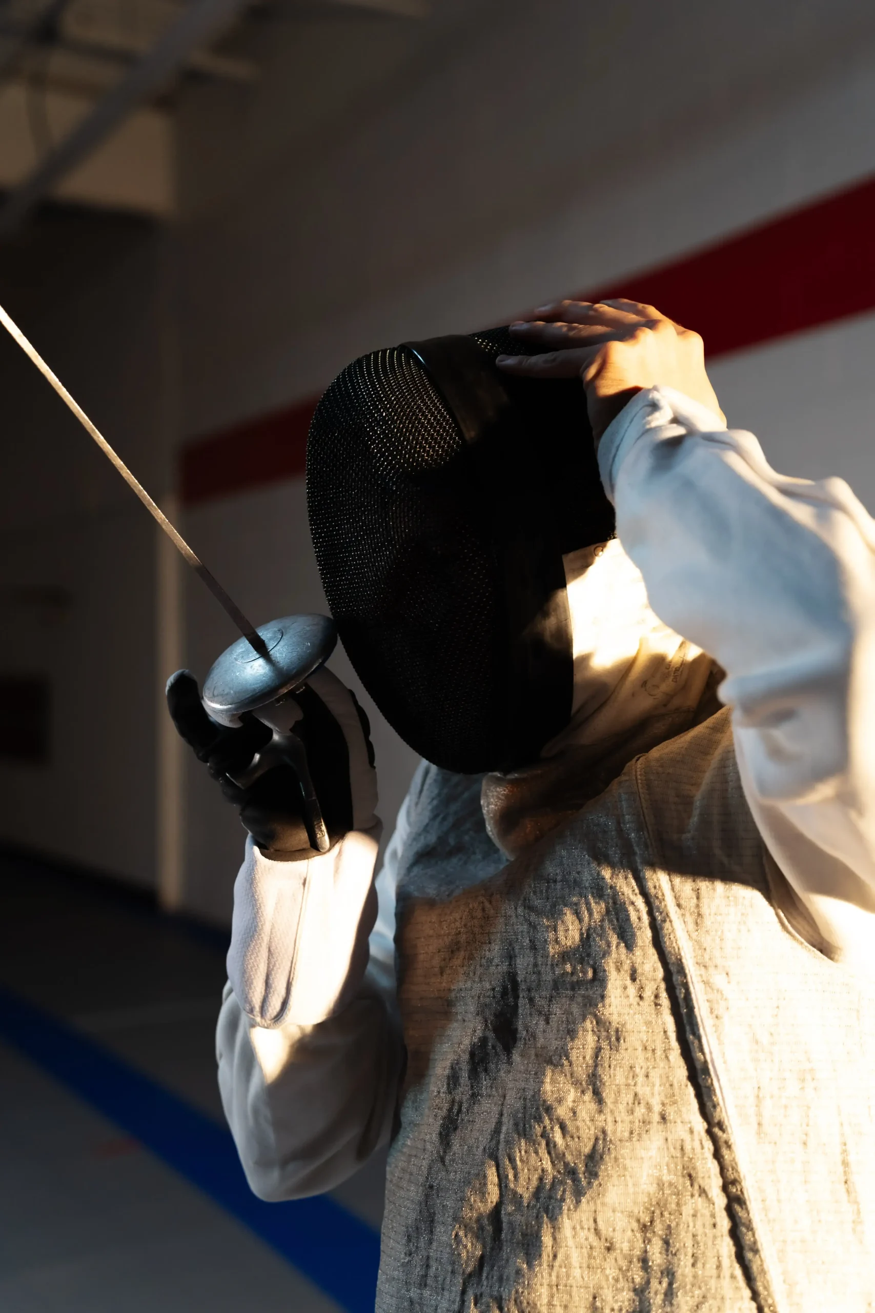 two fencers that are fencing